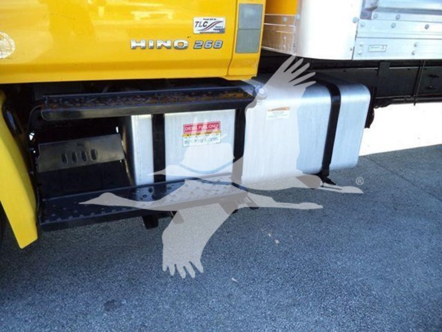 Hino 268 cab area showing fuel tank and battery box under the side of the truck