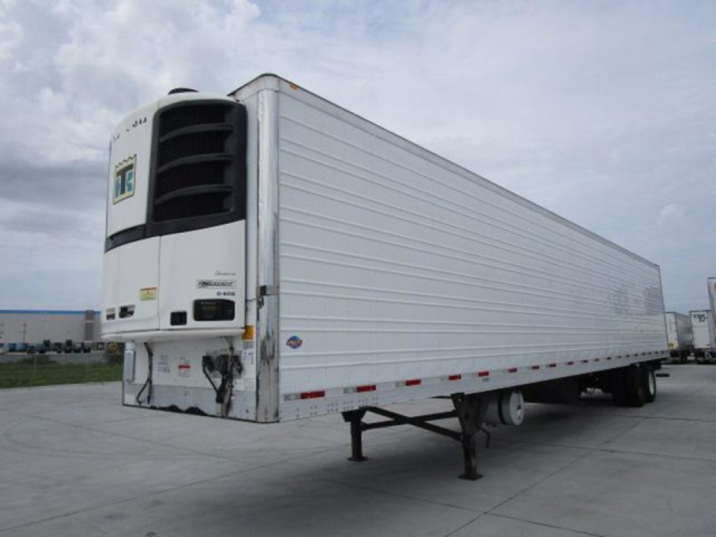 2019 Utility Reefer trailer with refrigeration unit at front, white panels, side rails, and landing gear visible.