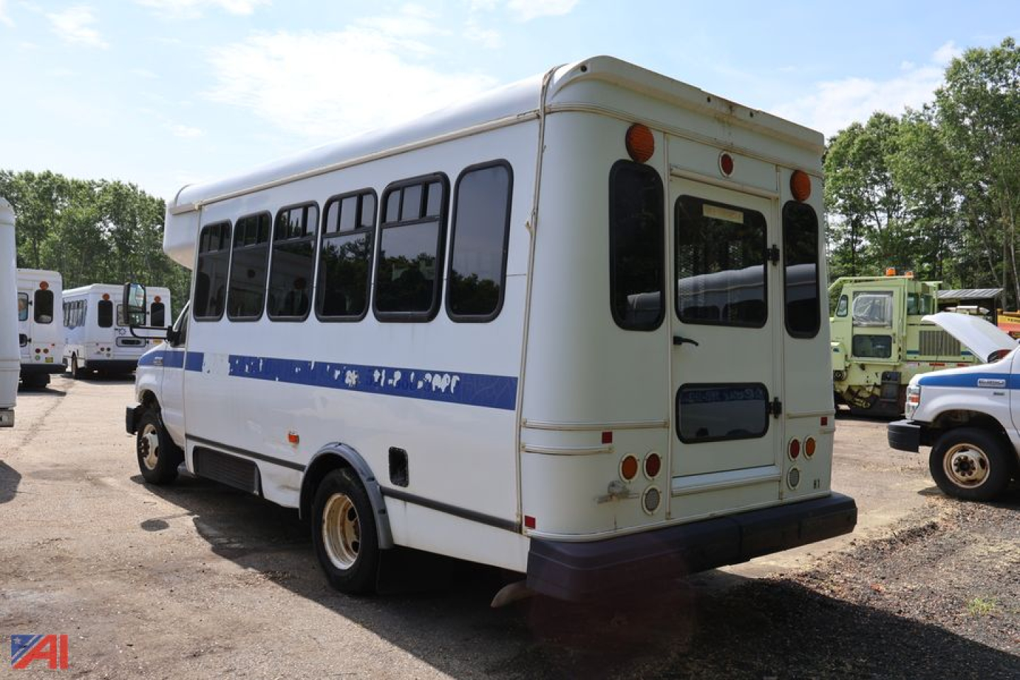 Ford E350 wheelchair bus rear/right side showing entry door and windows
