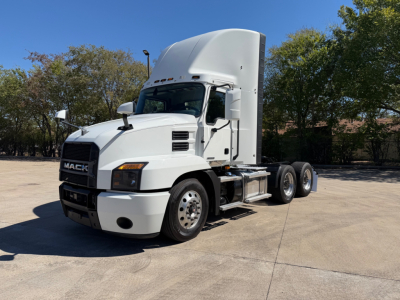 Mack ANTHEM 64T conventional daycab truck in white from a side-front view showing cab, hood, and dual rear axles.