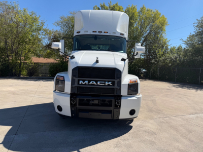 Mack anthem 64T truck front view showing grille with MACK logo and large bumper.