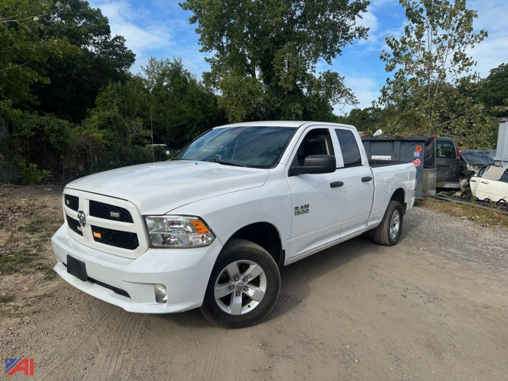 Ram 1500 pickup truck white extended cab 2017 DS model in a lot, front-left view showing RAM grille and badge