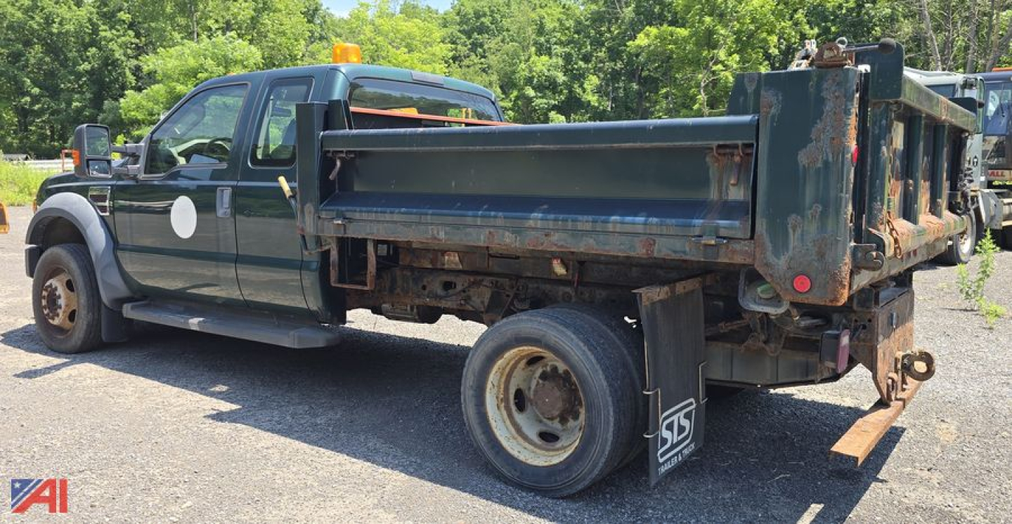 Dump truck bed and cab of a 2008 Ford F-450 Super Duty XL extended cab in a used condition.