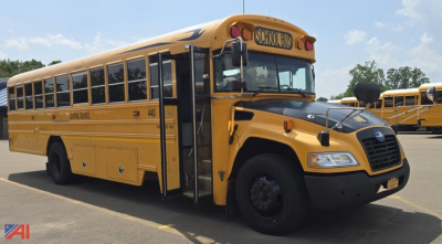 School bus showing front-left view with yellow body, black bumper, and 'SCHOOL BUS' sign; side shows 'ORANGE' lettering and bus number 440.