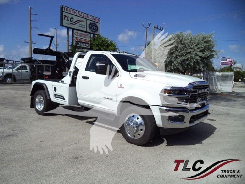 2026 Ram 4500 w/ winch features a heavy-duty tow setup and dual rear tires in a dealership lot.