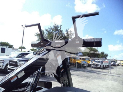 Ram 4500 winch truck mount with tall frame and mounting brackets visible.