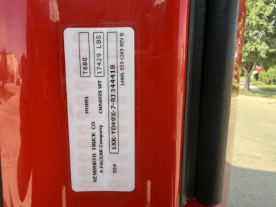 Kenworth truck door sticker showing model T680, weight and VIN details; label includes CHASSIS WT 17429 LBS and other specs.