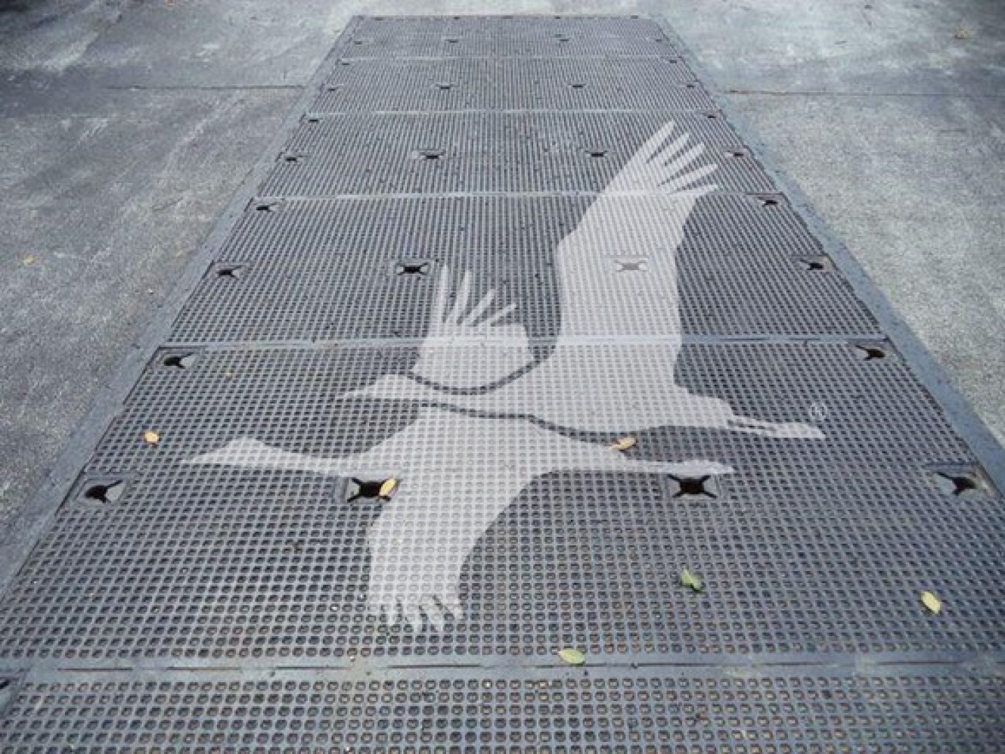 Stockton flatbed or rollback truck platform with Peterbilt 367 not visible, large metal grated surface with eagle decals.
