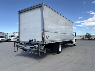 Freightliner M2-106 box truck rear and side view showing cargo area and rear bumper