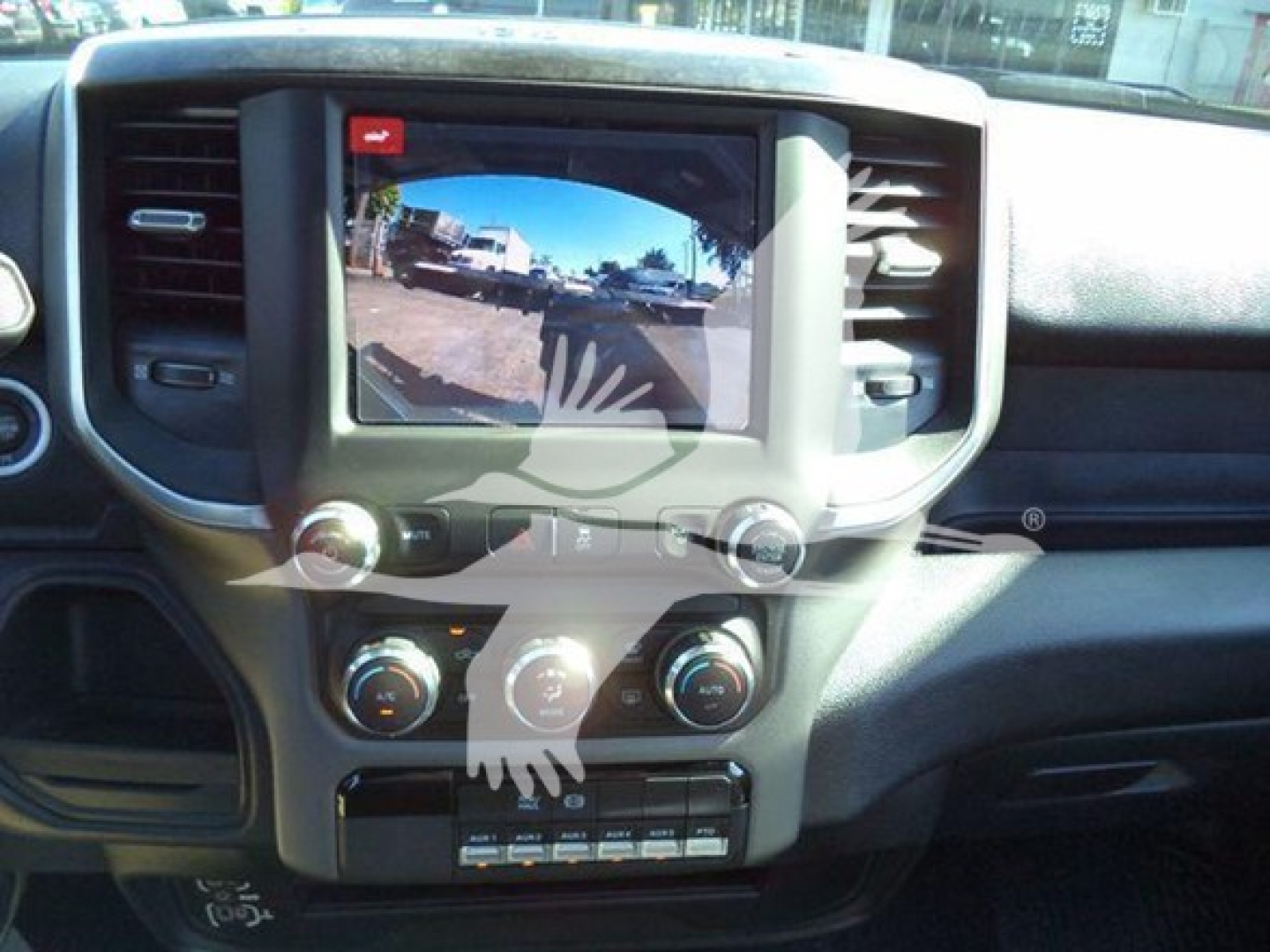 Ram 5500 interior dashboard showing touchscreen display and climate controls.