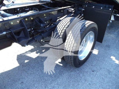 Ram 5500 chassis with rear dual wheels and suspension components visible; wheel, tire, and frame are in view