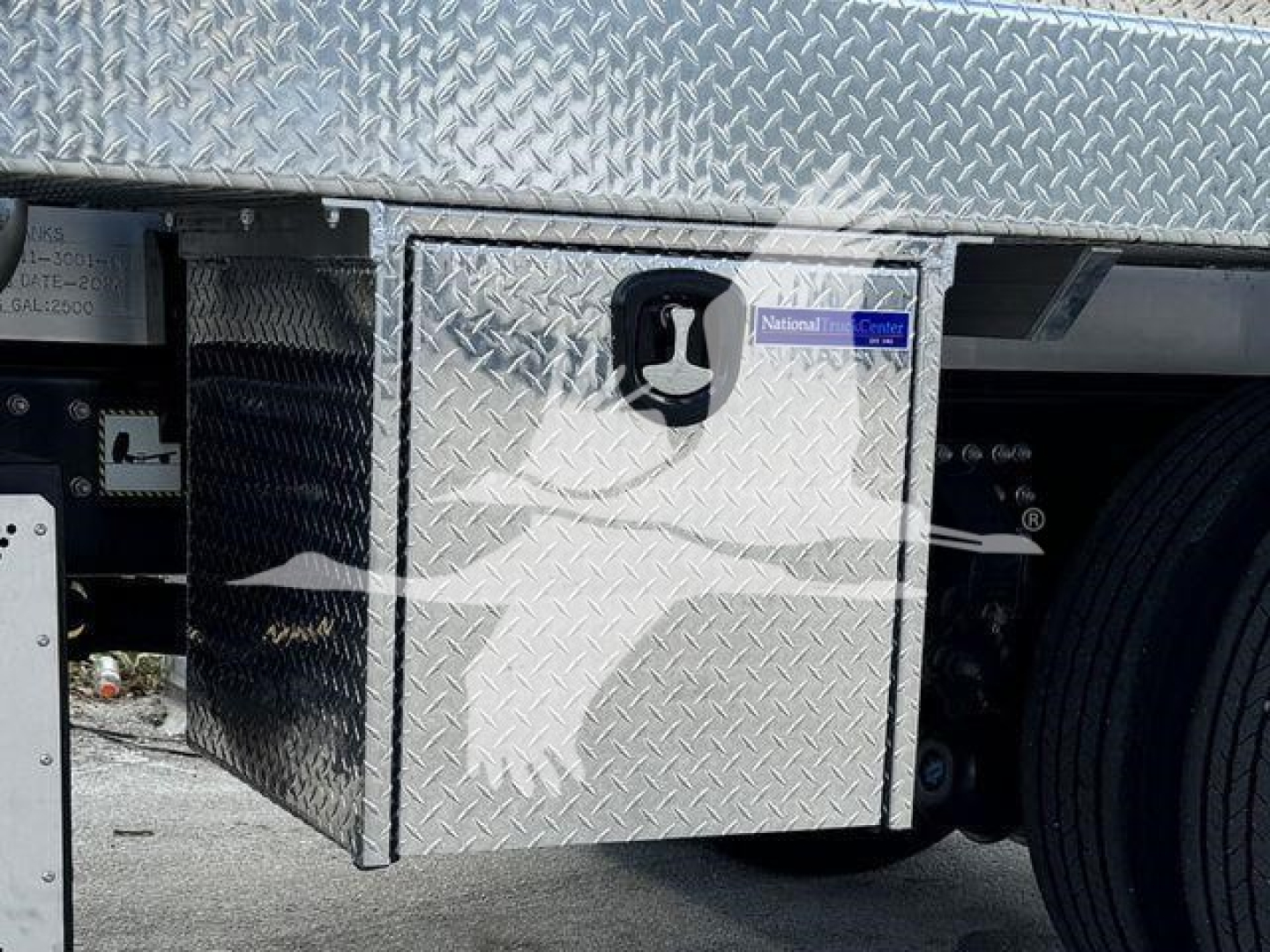 Sewer rodder truck side saddle fuel/toolbox area with diamond plate aluminum toolbox and wheel, 2023 Mack MD7