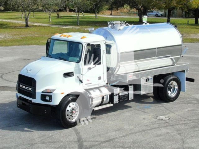 Mack MD7 sewer-rodder truck with a polished stainless steel tank, cab with white paint, and front grille showing 'MACK' logo. Tank has top equipment and access hatches.
