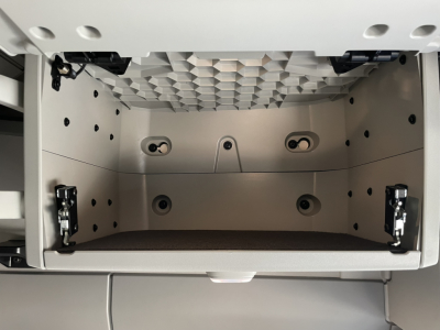 Volvo VNL64T860 cab storage drawer open showing interior panels and mounting holes.