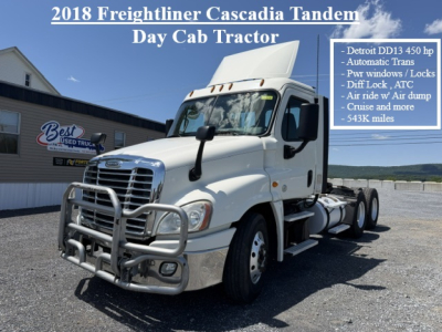 Truck image showing 2018 Freightliner Cascadia Day Cab Tractor with front bull bar and text overlay listing features and Detroit DD13 450 hp.