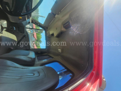 Cab interior of a 2006 Sterling Acterra truck showing driver seat and dashboard.  Text on windshield watermark reads www.govdeals.com.