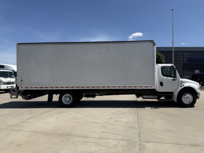 Side view of a 2020 Freightliner M2 box truck showing a large cargo box and cab.