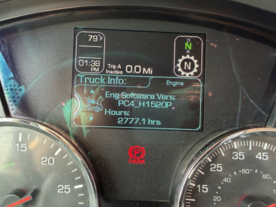 Kenworth T880 dash display showing Trip A info, engine hours 2777.1, engine software version PC4, H1520P, and gear indicator in N.