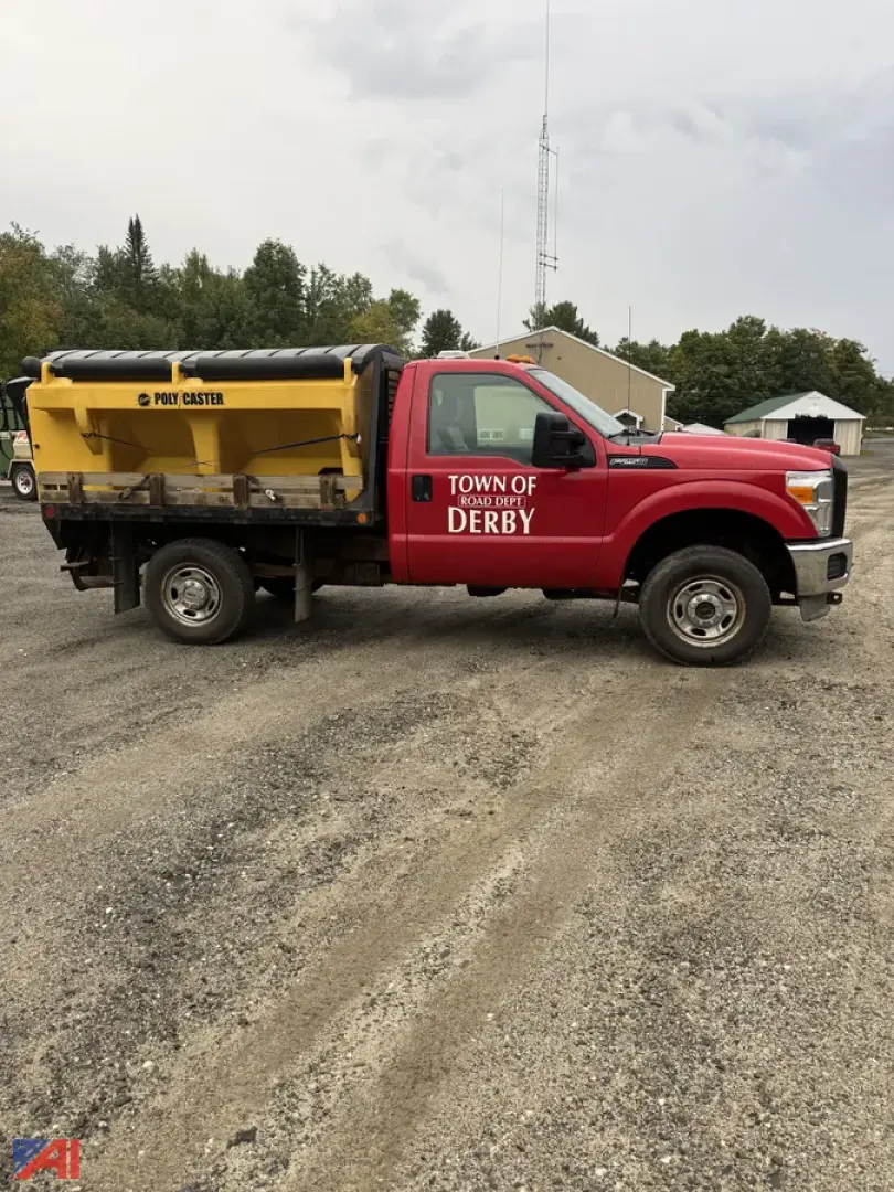 Ford F-250 Super Duty pickup truck with utility sander attachment in Ton of Derby, red cab yellow sander body.