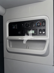 Kenworth T680 dash area showing control panel and dashboard ports.