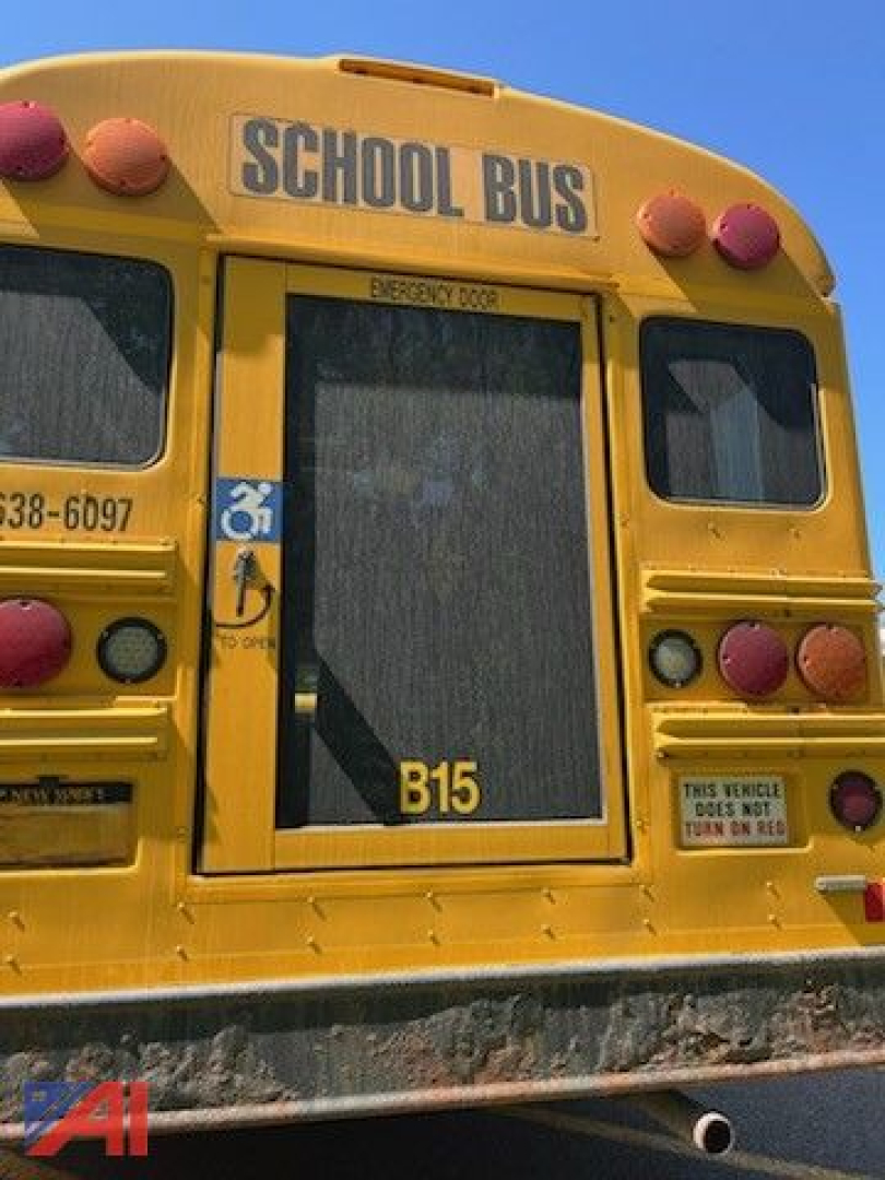 School bus rear view showing wheelchair access door and B15 label.