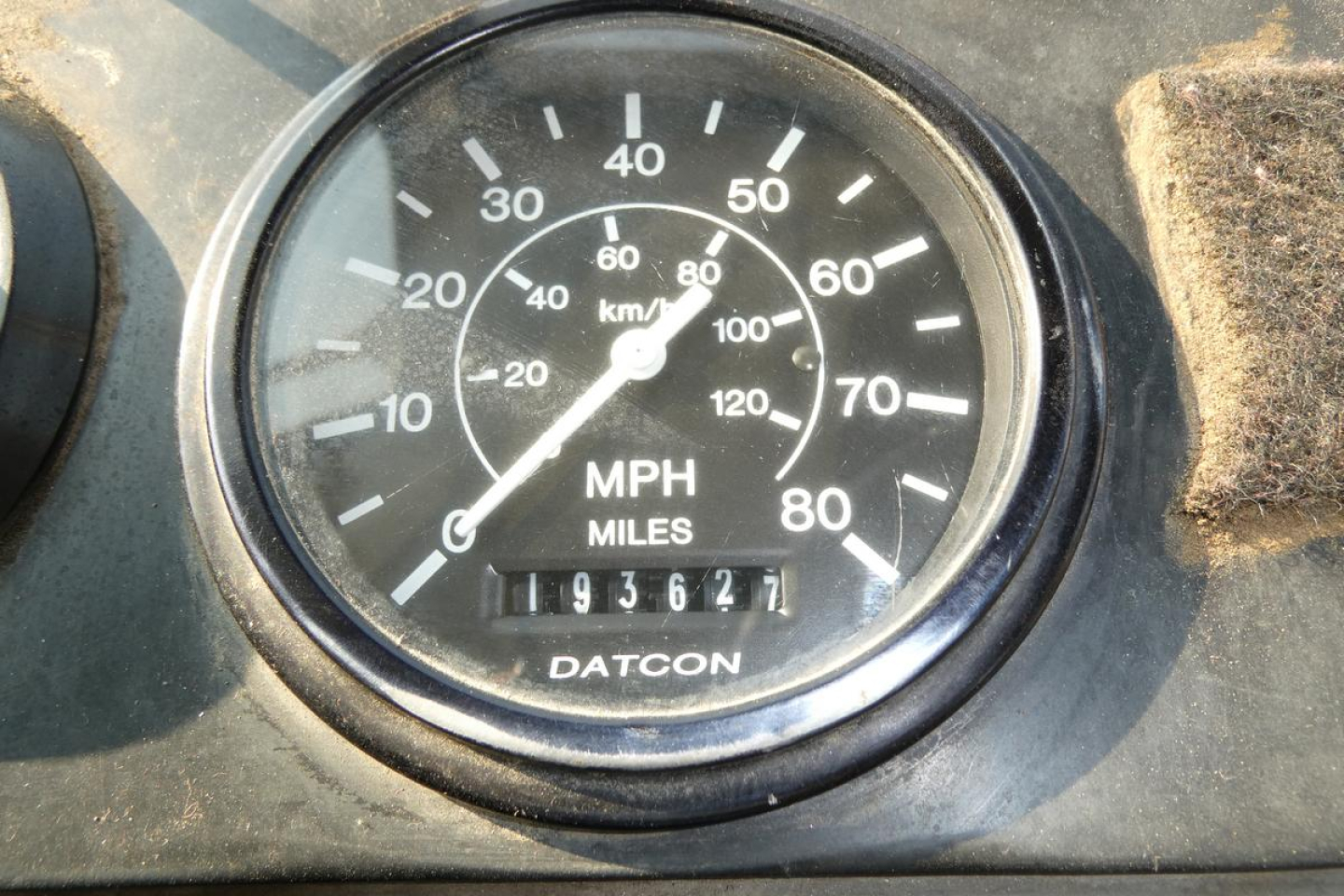Kalmar Ottawa YT30 yard truck gauge cluster showing speedometer with MPH and km/h, and an odometer reading 193,621 miles.