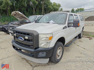 Ford F-250 Crew Cab pickup truck 2011 front-left view with hood up showing engine bay and gray grille