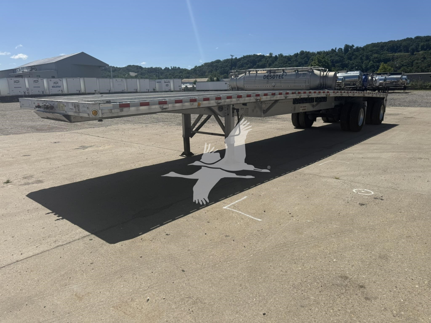 Flatbed trailer showing aluminum deck with tandem axles and Extended Big Bubba model by Reitnouer; VIN 1RNF48A25NR055931; stock 7238; flatbed trailer in used condition.