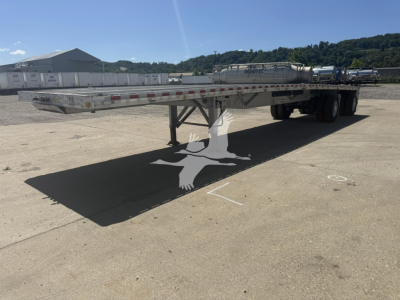 Flatbed trailer showing aluminum deck with tandem axles and Extended Big Bubba model by Reitnouer; VIN 1RNF48A25NR055931; stock 7238; flatbed trailer in used condition.