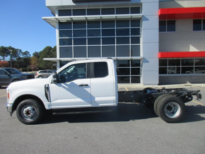 Ford F-350 Cab and Chassis side view showing white truck with chassis frame extending behind cab.