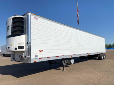 Trailer side view of a 2020 Wabash refrigerated trailer showing white exterior, 53 ft length, dual axles, front refrigeration unit, and landing gear with support legs.