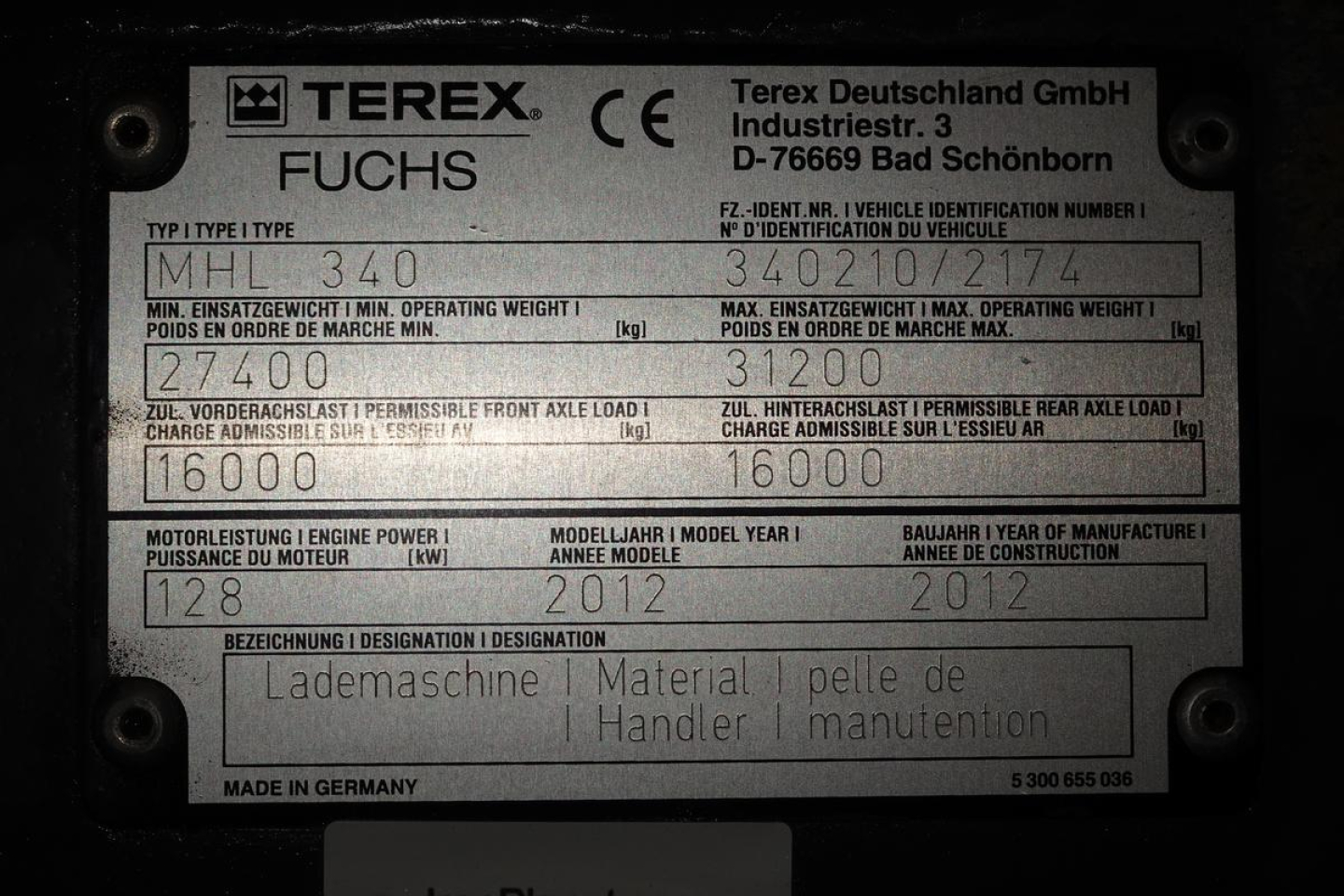 Terex MHL340D serial plate showing model MHL 340, weights and identifiers, with German labels and 2012 manufacture date.