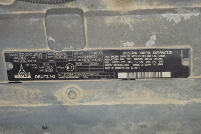 Emissions control information plate on Terex MHL340D showing model TCD 2012, serial numbers, brands (Deutz, Deutzag?), and various engine and emission codes.