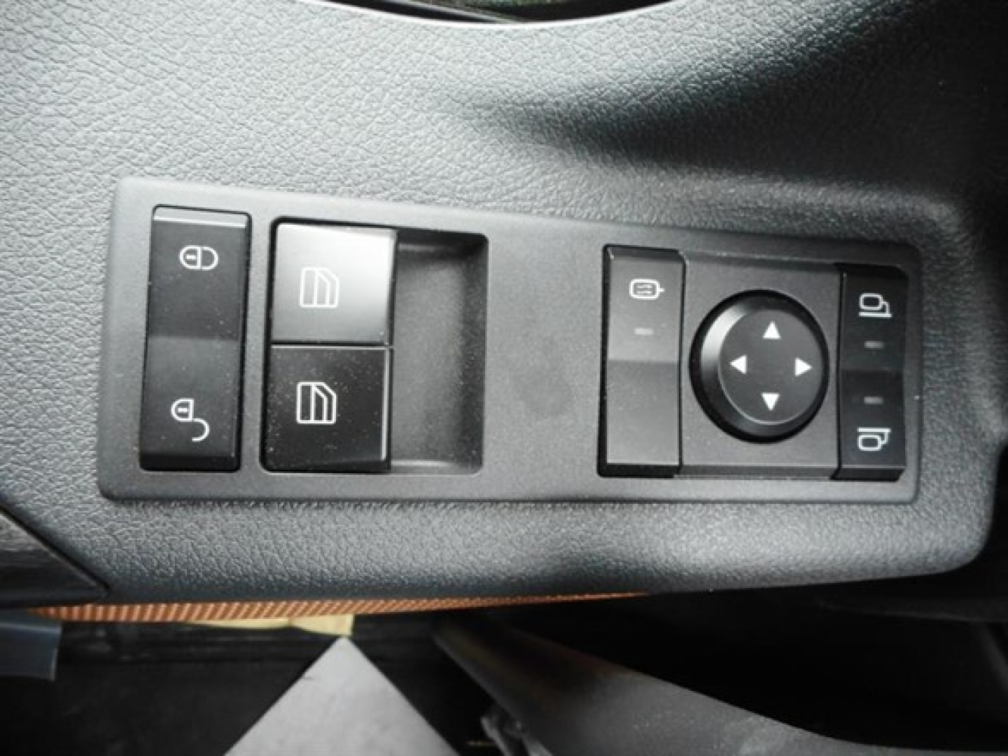 Truck interior control panel with window and mirror adjustment switches