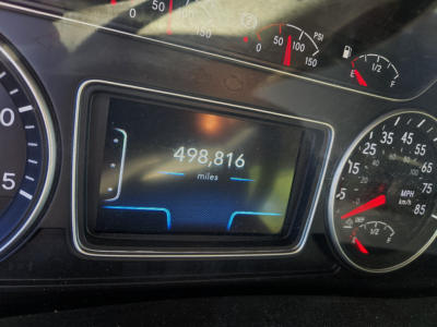 Instrument cluster display showing mileage 498,816 miles in a 2019 International LT625 Daycab Cummins engine truck interior