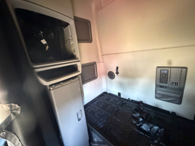 Volvo VNL64T760 truck cab interior sleeper area showing control panel and seating area not visible.