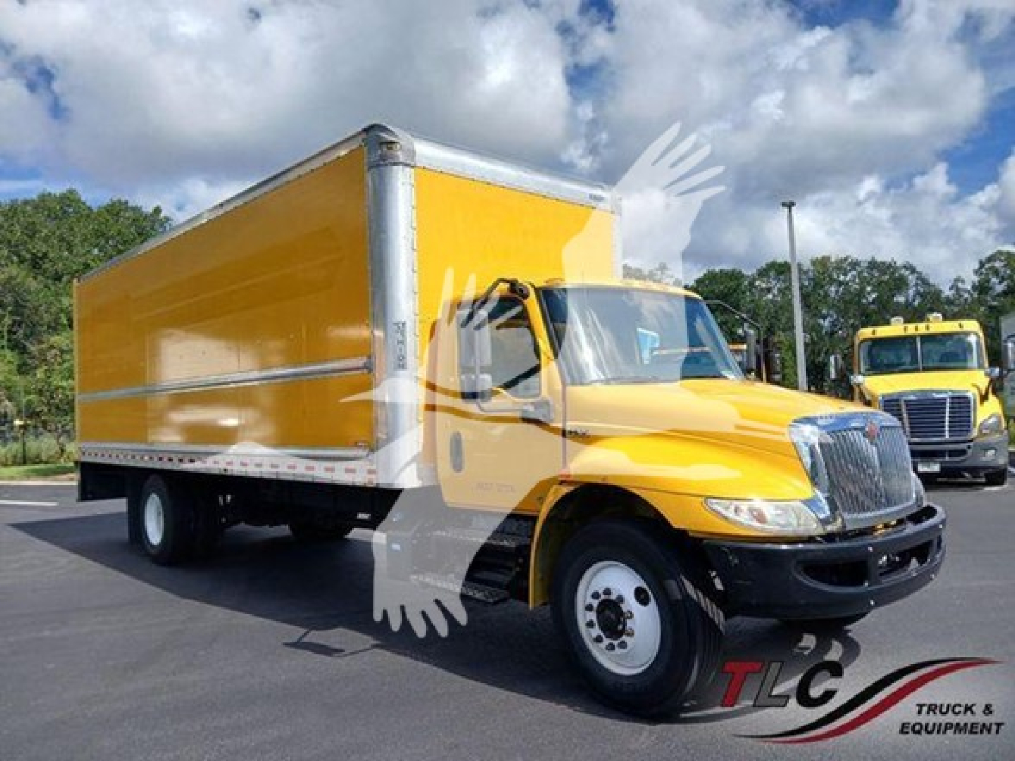 Box truck with a yellow cargo box and cab, 2020 International MV, side view showing stock number T76455 and VIN 3HAEUMML0LL076455.