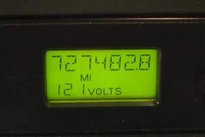 Dash display showing mileage 727,482.0? and 12.1 volts for a Freightliner Cascadia 125 truck inventory image.