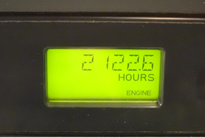 Dashboard hour meter reading 2122.6 hours for engine on 2013 Freightliner Cascadia 125 cab/engine bay context