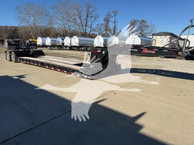 XL Specialized XL80H DGS lowboy trailer showing hydraulic or support components and front frame assembly.