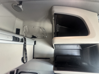 Peterbilt 579 cab interior showing overhead storage area and dash compartment