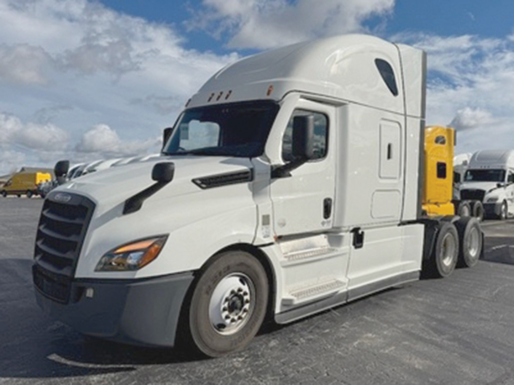 Freightliner Cascadia126 tractor with sleeper cab showing front and side view.