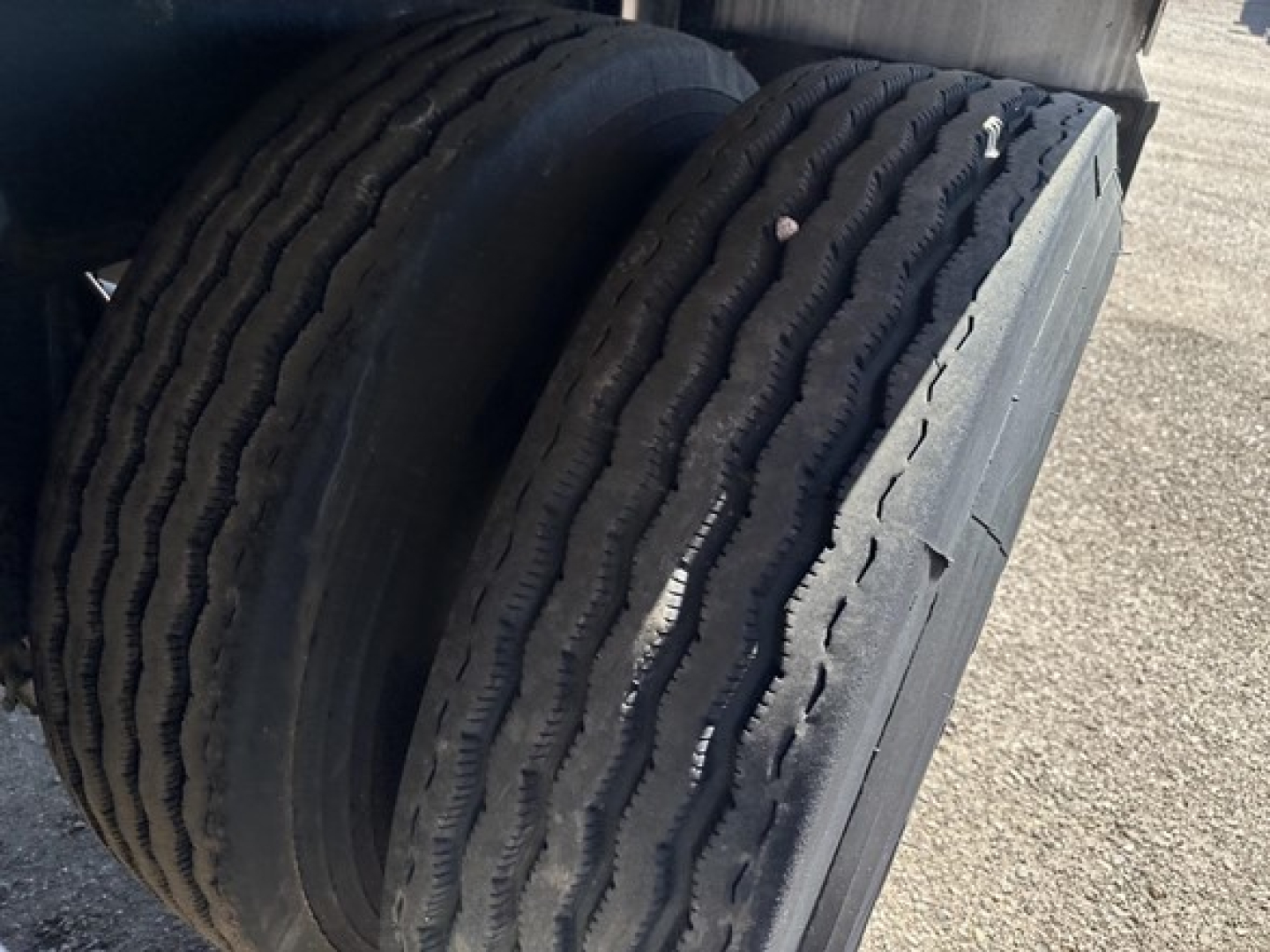 Trailer tires on Fontaine Infinity 48' spread air combo flatbed showing dual tires and tread detail.