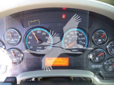 Dashboard of a 2019 International Durastar 4300 showing gauges, warning lights, and an orange diagnostic display.