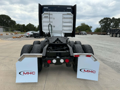 Kenworth T680 rear view showing fifth wheel, dual rear axles, mudflaps with MHC logo, and white tail area; stock number 0631429 visible.