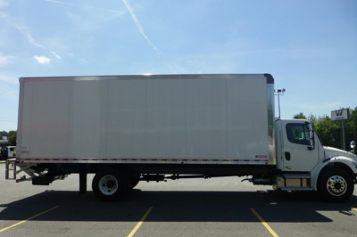Freightliner M2 106 box truck side profile showing cargo box and cab with wheels and chassis.