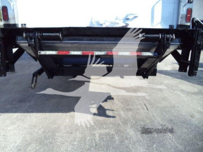 Back view of a refrigerated 2019 International Durastar 4300 showing the rear chassis and bumper with hydraulic lift and support bars.
