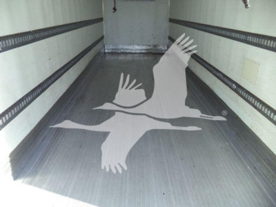 Trailer cargo area of a refrigerated 2019 International Durastar 4300 showing interior walls and floor.