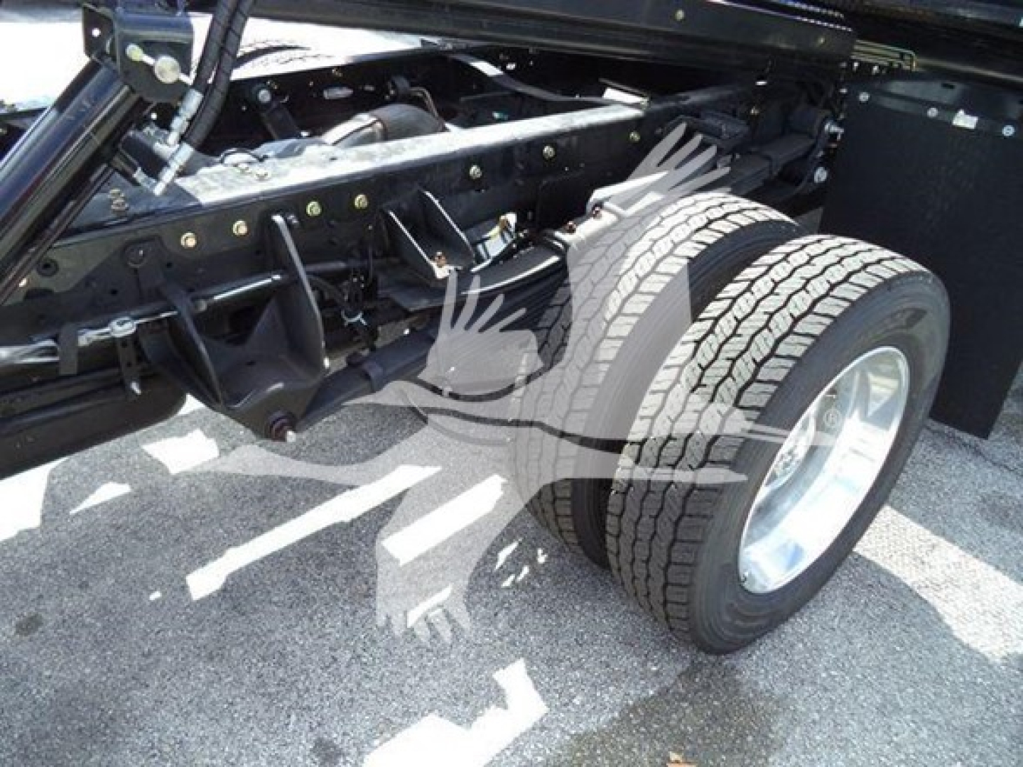 Ram 5500 chassis and dual rear wheels showing suspension and drive axle