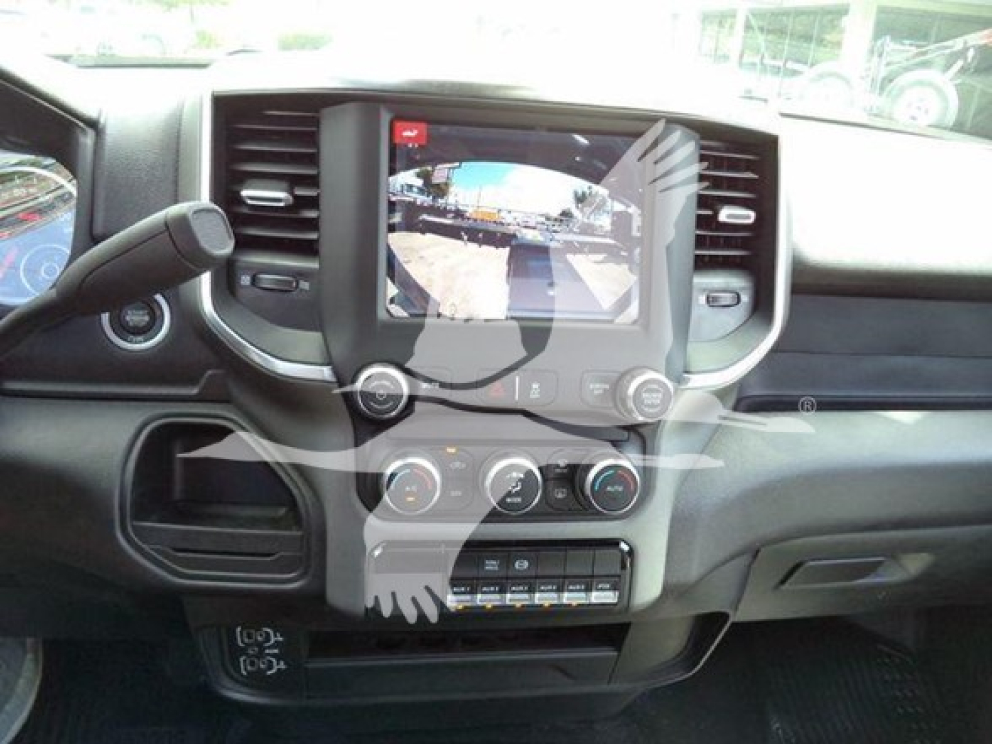 Ram 5500 dashboard showing infotainment screen and climate controls.